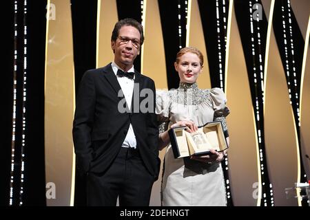 British actress Emily Beecham (R) poses next to French actor Reda Kateb on stage after she was awarded with the Best Actress Prize for her part in 'Little Joe' on May 25, 2019 during the closing ceremony of the 72nd edition of the Cannes Film Festival in Cannes, southern France. Photo by David Niviere/ABACAPRESS.COM Stock Photo