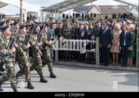 Leon Gautier, Emmanuel and Brigitte Macron attending a ceremony to pay homage to the Kieffer commando on June 6, 2019 in Colleville-Montgomery, Normandy. The Kieffer commando, an elite French unit, was among the first waves of Allied troops to storm the heavily defended beaches of Nazi-occupied northern France, beginning the liberation of western Europe. Photo by Jacques Witt/Pool/ABACAPRESS.COM Stock Photo