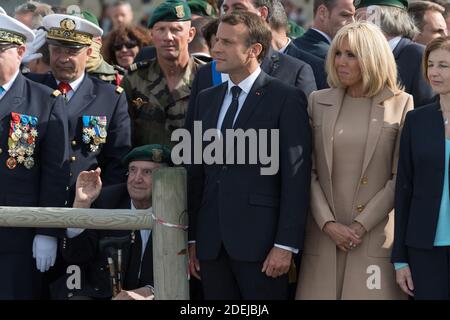 Leon Gautier, Emmanuel and Brigitte Macron attending a ceremony to pay homage to the Kieffer commando on June 6, 2019 in Colleville-Montgomery, Normandy. The Kieffer commando, an elite French unit, was among the first waves of Allied troops to storm the heavily defended beaches of Nazi-occupied northern France, beginning the liberation of western Europe. Photo by Jacques Witt/Pool/ABACAPRESS.COM Stock Photo