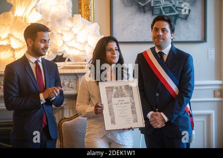 L-R : Omar Didi (MAG), Lina Al Hathloul receives honorary citizenship for her sister, jailed Saudi activist Loujain Al Hathloul from Paris Mayor Deputy Patrick Klugman at Hotel de Ville or City Hall, in Paris, France on June 21, 2019. Photo by Balkis Press/ABACAPRESS.COM Stock Photo