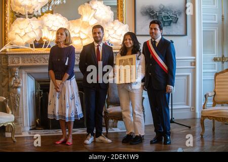 L-R : Genevieve Garrigos (Amnesty International), Omar Didi (MAG), Lina Al Hathloul receives honorary citizenship for her sister, jailed Saudi activist Loujain Al Hathloul from Paris Mayor Deputy Patrick Klugman at Hotel de Ville or City Hall, in Paris, France on June 21, 2019. Photo by Balkis Press/ABACAPRESS.COM Stock Photo