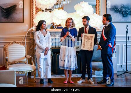 L-R : Lina Al Hathloul receives honorary citizenship for her sister, jailed Saudi activist Loujain Al Hathloul, Genevieve Garrigos (Amnesty International), Omar Didi (MAG) and Paris Mayor Deputy Patrick Klugman at Hotel de Ville or City Hall, in Paris, France on June 21, 2019. Photo by Balkis Press/ABACAPRESS.COM Stock Photo