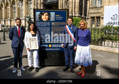 L-R : Omar Didi (MAG), Lina Al Hathloul with honorary citizenship for her sister, jailed Saudi activist Loujain Al Hathloul, Paris Mayor Deputy Patrick Klugman, Genevieve Garrigos (Amnesty International), pose next to a portrait of the jailed activist, near Hotel de Ville or City Hall, in Paris, France on June 21, 2019. Photo by Balkis Press/ABACAPRESS.COM Stock Photo