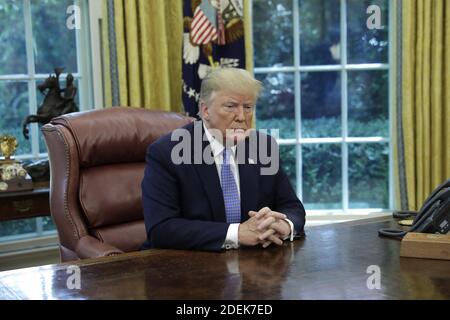US President Donald Trump listens during a meeting on the the opioid epidemic in the Oval Office at the White House in Washington, D.C., on June 25, 2019. Photo by Yuri Gripas/Pool/ABACAPRESS.COM Stock Photo