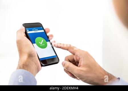 Businessman using smartphone transferring money online via electronic internet banking application - financial technology or fintech concept Stock Photo