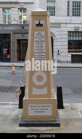 The Cornhill Water Pump outside the Royal Exchange at Cornhill in the City of London, England, UK Stock Photo