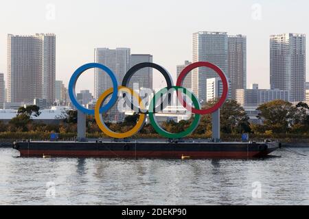 Tokyo, Japan. 1st Dec, 2020. Giant Olympic rings are reinstalled at the waterfront area in Odaiba Marine Park. The Olympic symbol, which size (33 meters wide, 15 meters tall and and weighing about 69 tons), will be displayed until the end of Tokyo 2020 Games in August 2021. Credit: Rodrigo Reyes Marin/ZUMA Wire/Alamy Live News Stock Photo