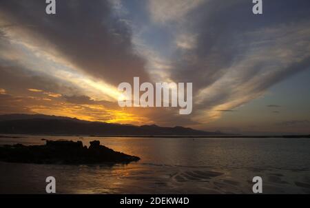 Beautiful sunset over Las Canteras beach in Las Palmas de Gran Canaria Stock Photo