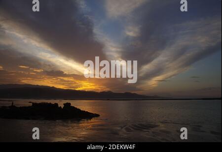 Beautiful sunset over Las Canteras beach in Las Palmas de Gran Canaria Stock Photo