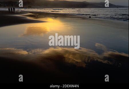 Beautiful sunset over Las Canteras beach in Las Palmas de Gran Canaria Stock Photo