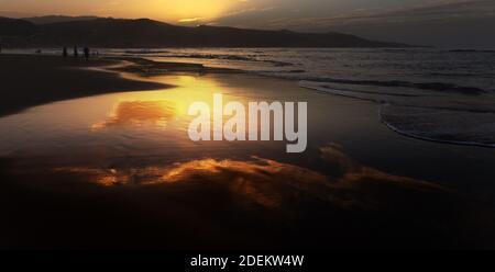 Beautiful sunset over Las Canteras beach in Las Palmas de Gran Canaria Stock Photo