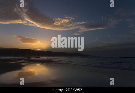 Beautiful sunset over Las Canteras beach in Las Palmas de Gran Canaria Stock Photo