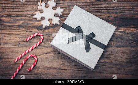 Silver shiny gift box for Christmas and New Year. Stock Photo