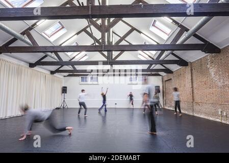 Group of people dancing blurred movement Stock Photo