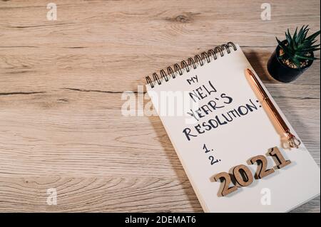 2021 New Year's resolutions with Christmas decorations. Overhead view Stock Photo
