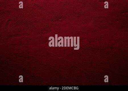 Crimson colored wall background with textures of different shades of red Stock Photo