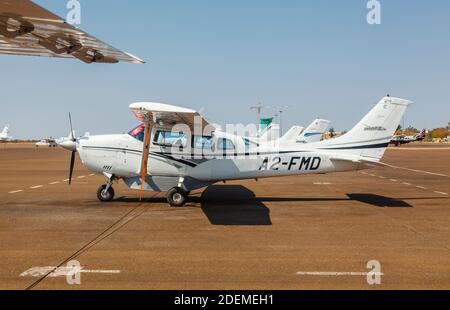 Mack Air Cessna 206 Stationair light aircraft used for safari transport short flights parked on the runway at Maun Airport, Botswana, southern Africa Stock Photo