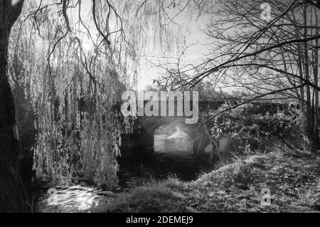 Infrared shot of the Bridge over the Otter at Otterton, Devon. Stock Photo
