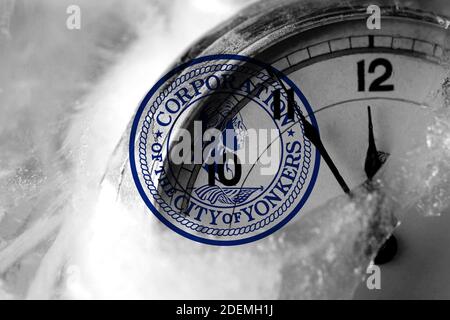 United States of America, America, US, USA, American, Yonkers, New York flag with clock close to midnight in the background. Happy New Year concept Stock Photo