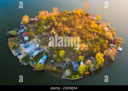Szigetszentmiklós, Hungary - Aerial drone view of a tiny fishing island on Lake Kavicsos (Kavicsos to) near Budapest. Stock Photo