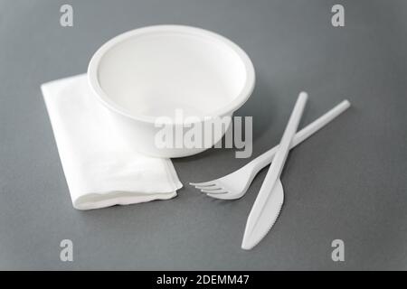 disposable plastic plate with fork and knife Stock Photo
