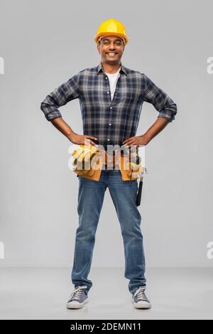 happy indian worker or builder with crossed arms Stock Photo