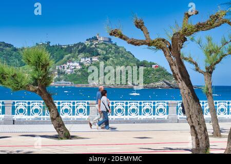 SAN SEBASTIA, SPAIN - May 16, 2012: San Sebastian, Spain, May 2012: View on Monte Igueldo in San Sebastian, as seen from the city on the opposite side Stock Photo