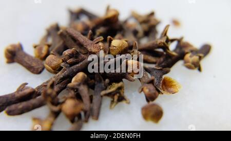 Close up of a pile of dry cloves. Stock Photo