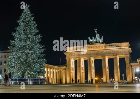 Christmas Tree on brandenburg gate in berlin, christmas tree in front of the brandenburg gate Stock Photo