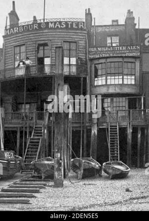 Old photograph of traditional pub The Grapes in Limehouse, London docklands. Mentioned by Charles Dickens in Our Mutual Friend. Still in operation. Stock Photo