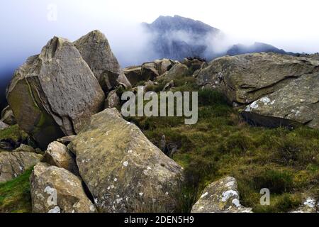 Shown here is a boulder field near Lake Ogwen in Snowdonia with Tryfan mountain in the background. Stock Photo