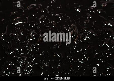 Abstract background of black gelatin with white light. Stock Photo