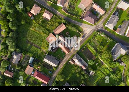 Flying over a village in Transylvania. Aerial drone view of Manastireni, Romania Stock Photo