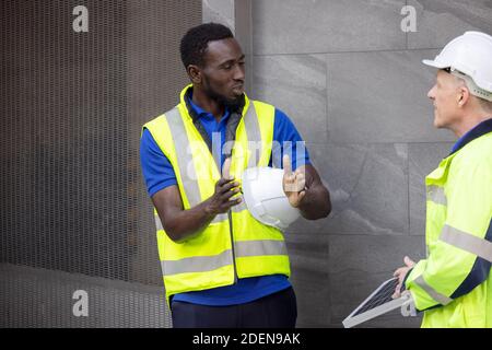 Team Meeting of Renewable Energy Engineers Working on an Innovative More Efficient Solar Panel Battery Concept, Solving Problems Stock Photo