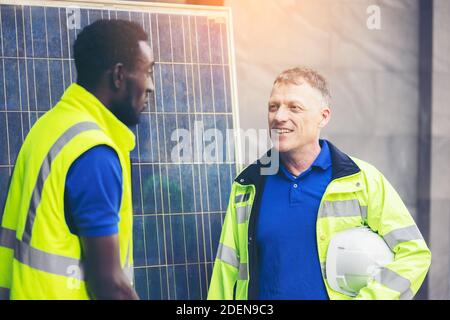 Team Meeting of Renewable Energy Engineers Working on an Innovative More Efficient Solar Panel Battery Concept, Solving Problems Stock Photo