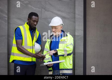 Team Meeting of Renewable Energy Engineers Working on an Innovative More Efficient Solar Panel Battery Concept, Solving Problems Stock Photo