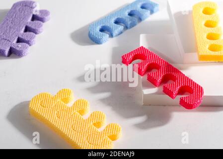 Cotton pads for removal makeup with woman hands cotton flowers on the beige background flatlay Stock Photo