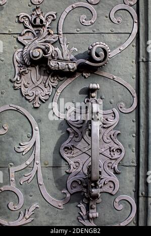 antique ornate door handle on an old building Stock Photo