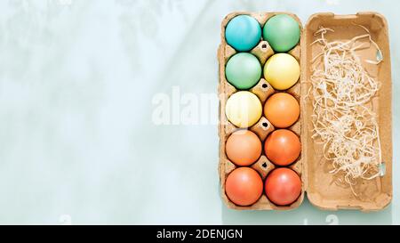 Multi-colored Easter eggs in carrying and transportation carton or box Stock Photo