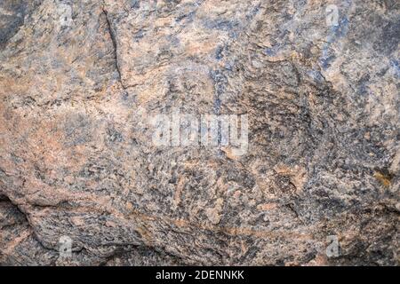 Surface of rough rocky cliff Stock Photo