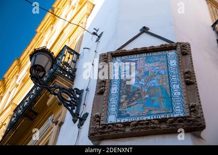 Mary and Jesus greeting the wisemen in an azulejo, a Spanish tile art seen throughout Seville, in the heart of Andalusia, Spain. Stock Photo