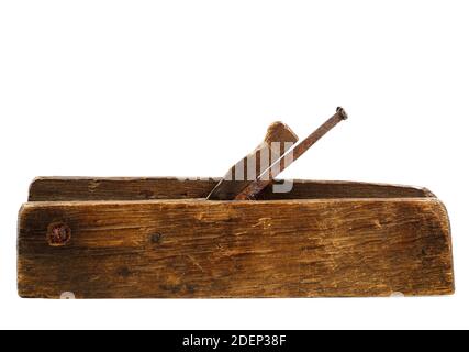 old wooden plane with a rusty blade on a white background Stock Photo