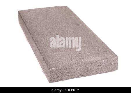 Block of thermal insulation with graphite polystyrene for thermal insulation of house walls isolated on the white background Stock Photo