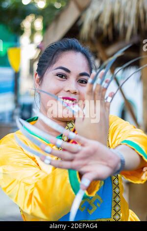 Tradtional pangalay, an indigenous Muslim Mindanao dance is performed at the Maranao Village at the Bangsamo Governement Center in Cotabato City Stock Photo