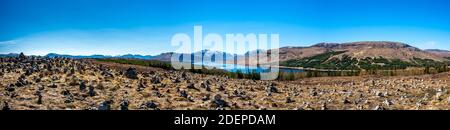 Panorama of a rock garden in the Northwest Highlands of Scotland with Lock Loyne in the background Stock Photo