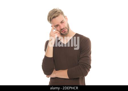 charismatic thoughtful guy with trendy hairstyle wearing clothes in casual style having headache isolated on white, male health. Stock Photo