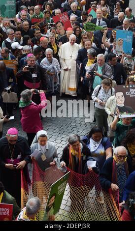 Pope Francis, catholic prelates and representatives of the Amazon Rainforest's ethnic groups march in procession during the opening of the Special Assembly of the Synod of Bishops for the Pan-Amazon Region on October 7, 2019 outside St. Peter's Basilica in the Vatican. Francis denounced past and present forms of colonialism and said some of the fires that devastated forests in Brazil in recent months were set by special interest groups. Photo by Eric Vandeville/ABACAPRESS.COM Stock Photo