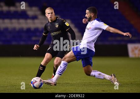 OLDHAM, ENGLAND. DECEMBER 1ST Oldham Athletic's Harry Clarke clears from Tranmere Rovers' Liam Feeney during the Sky Bet League 2 match between Oldham Athletic and Tranmere Rovers at Boundary Park, Oldham on Tuesday 1st December 2020. (Credit: Eddie Garvey | MI News) Credit: MI News & Sport /Alamy Live News Stock Photo