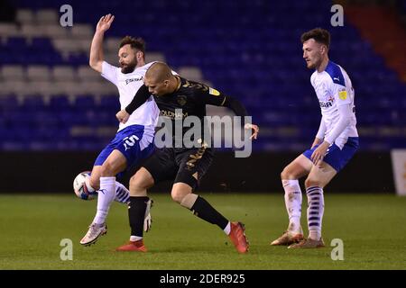 OLDHAM, ENGLAND. DECEMBER 1ST Oldham Athletic's Harry Clarke clears from Tranmere Rovers' Danny Lloyd and Tranmere Rovers' Paul Lewis during the Sky Bet League 2 match between Oldham Athletic and Tranmere Rovers at Boundary Park, Oldham on Tuesday 1st December 2020. (Credit: Eddie Garvey | MI News) Credit: MI News & Sport /Alamy Live News Stock Photo