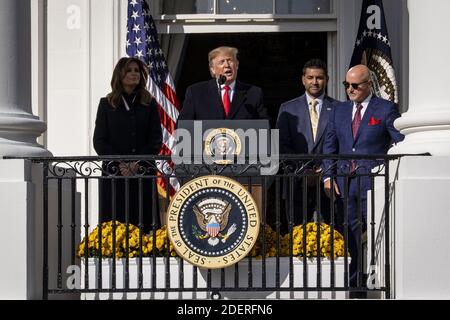 First lady Melania Trump, from left, Nationals' manager Dave Martinez and Nationals' general manager Mike Rizzo look on as President Donald Trump welcomes the 2019 World Series Champions, The Washington Nationals, on the South Lawn of the White House on Nov. 4, 2019 in Washington, D.C. Sean Doolittle, the star reliever who has been vocal on social issues, did not attend a ceremony, saying it is hosted by a president who empowers white supremacists and mocks disabled people. Photo by Pete Marovich/ABACAPRESS.COM Stock Photo